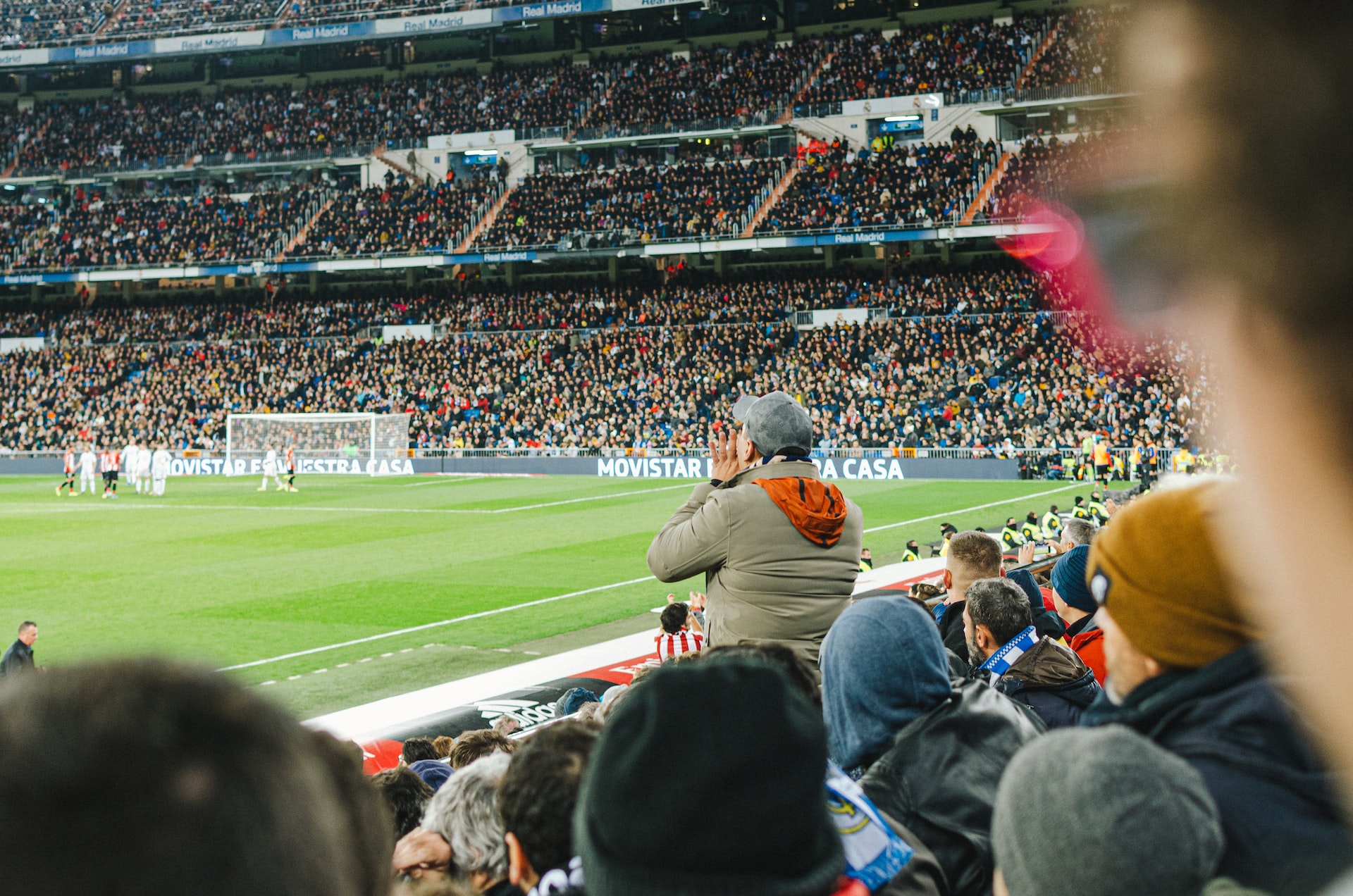 Image of a man cheering for his football team